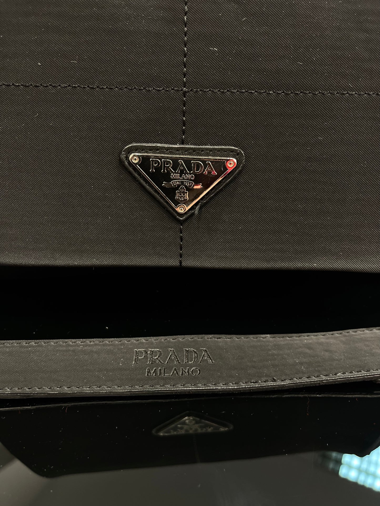 Prada triple