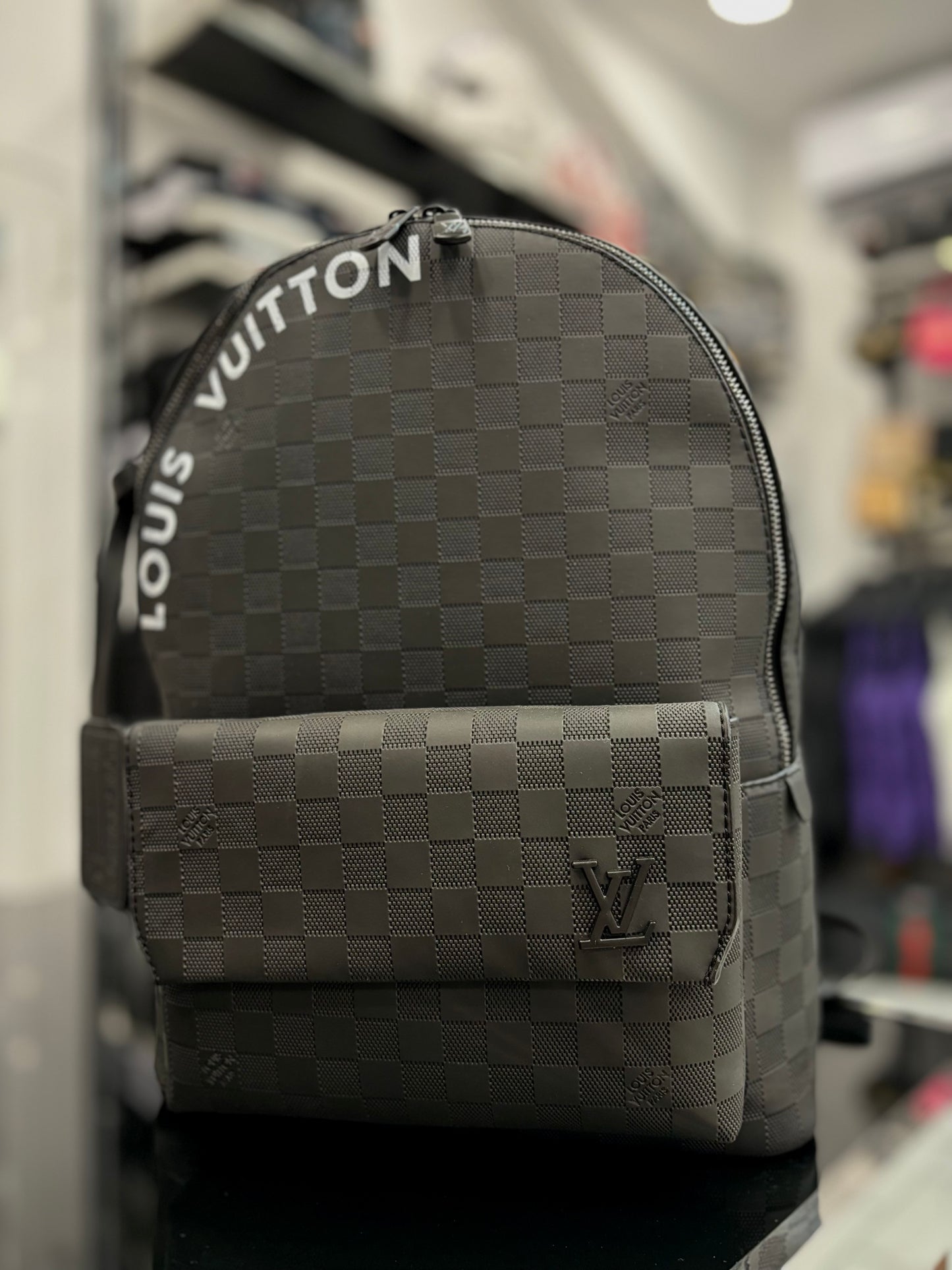 Background Louis Vuitton black backpack