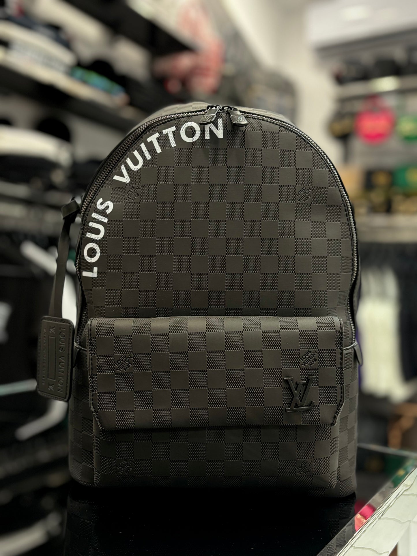 Background Louis Vuitton black backpack